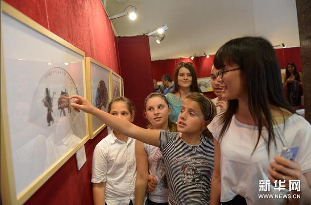 ���й����滭չ�����ఢ�������ǵ�����