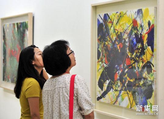 �����ۻع�չ1953��2013̨����Ļ