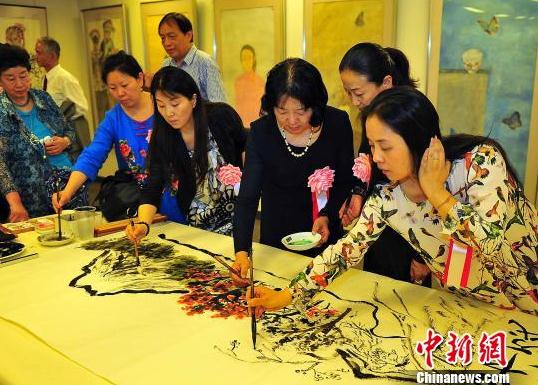 �ִ��й�Ů����ʮ��չ�ձ�������Ļ