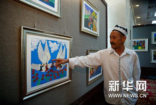 新疆麦盖提刀郎农民画晋京汇报展在京启幕