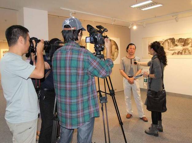 ����ī���ϡ����Ŷ���ɽˮ����Ʒչ���ڰ��տ�չ