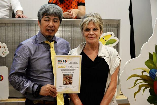 中国画家张尚明荣膺米兰世博会金奖